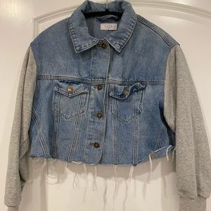 A Jean jacket with sweatshirt sleeves